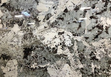 Branco Tourmaline Granite close photo Branco Tourmaline Granite close photo