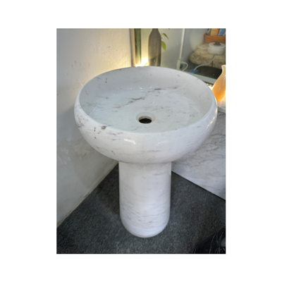Умывальник из белого мрамора с круглой чашей